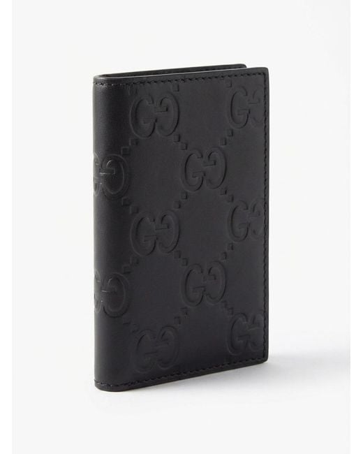 Gucci Black Gg Embossed Long Card Holder for men