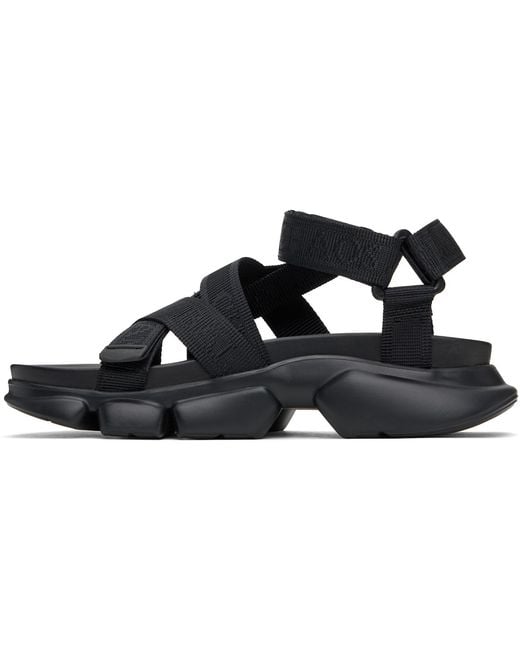 Undercover Black Cross-Strap Sandals
