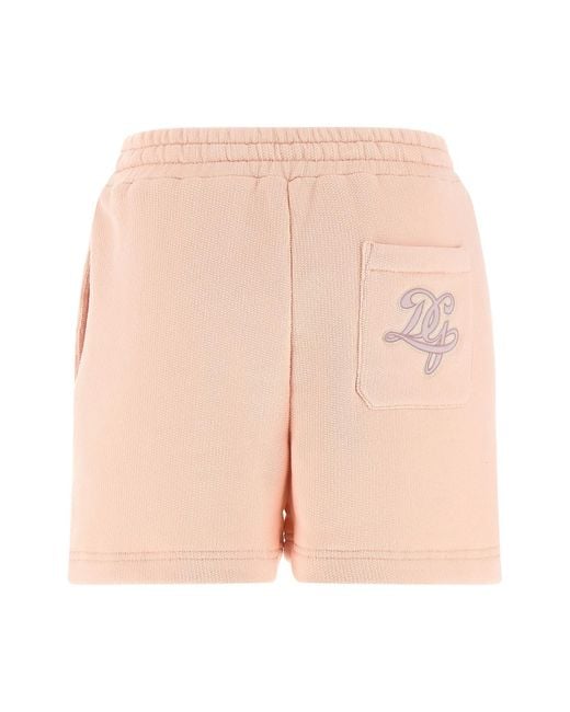 Dolce & Gabbana Pink Logo Patch Shorts