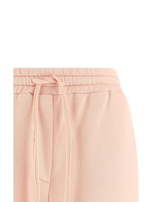 Dolce & Gabbana Pink Logo Patch Shorts