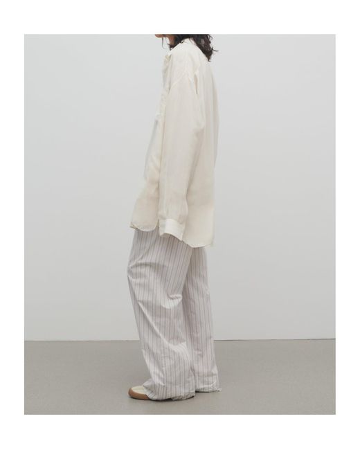 パンツ The Row Hypnosta Trousers In White With Stripes Hypnosta cotton poplin wide-leg pants in white - The Row