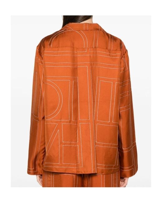 Totême Orange Shirt With Notched Collar And All-Over Logo Print