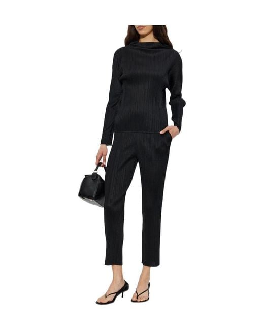 Pleats Please Issey Miyake Black Plissé-Effect Trousers