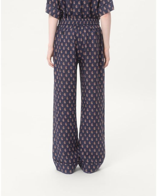 Valentino Blue Lightweight Cuffed Linen Trousers With Voyage Imaginaire Print for men