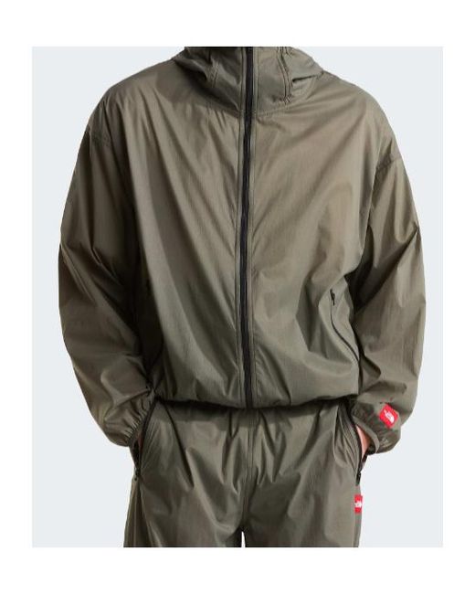 The North Face Green Tnf Box Packable Hooded Wind Jacket for men
