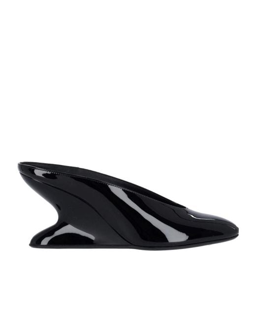 Alaïa Black Mules With Curved Wedges