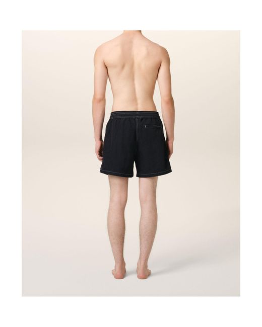 AMI Black Logo Embroidered Swim Shorts for men