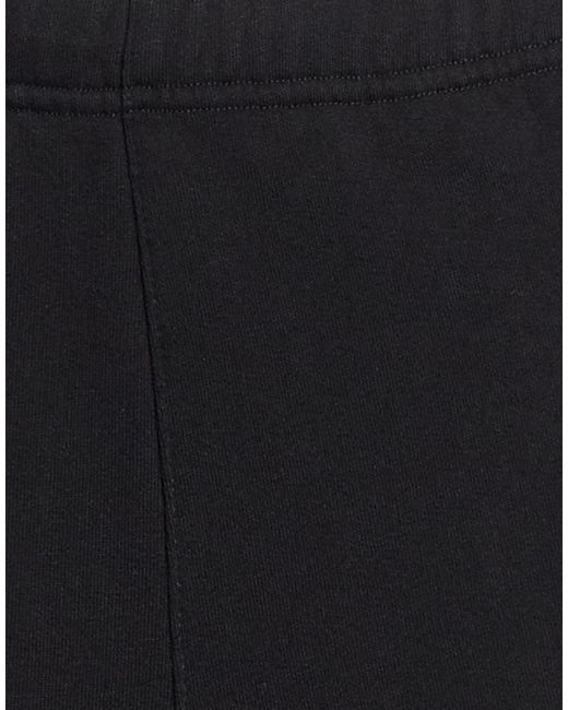 MM6 by Maison Margiela Black Solid Color Printed Casual Pants