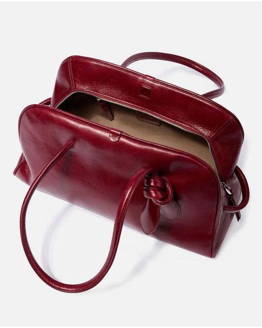 Jacquemus Red The Turismo Logo Embossed Bowling Bag