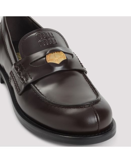 Miu Miu Black Leather Penny Loafers