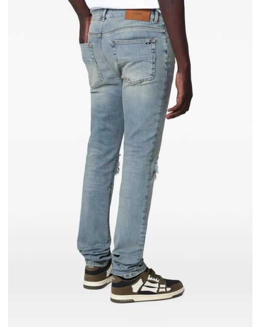 Amiri Blue Distressed Flannel Mx1 Jeans for men