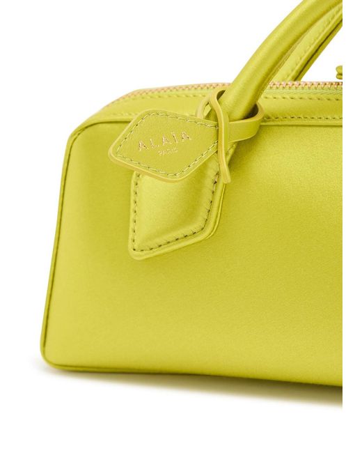 Alaïa Yellow Satin Clutch