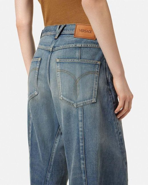 Versace Blue Logo-Patch Twisted Jeans