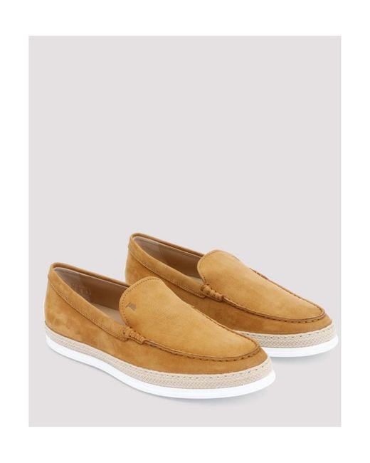 Tod's White Logo Embossed Slip-On Loafers for men