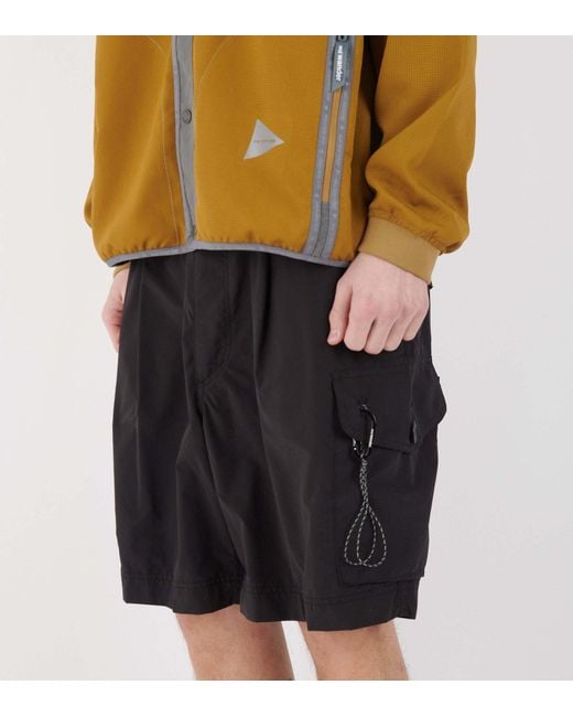 And Wander Black Oversized Cargo Shorts for men