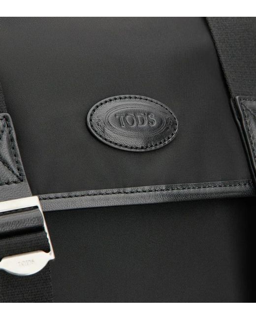 Tod's Black Logo Patch Buckle-Strap Backpack for men