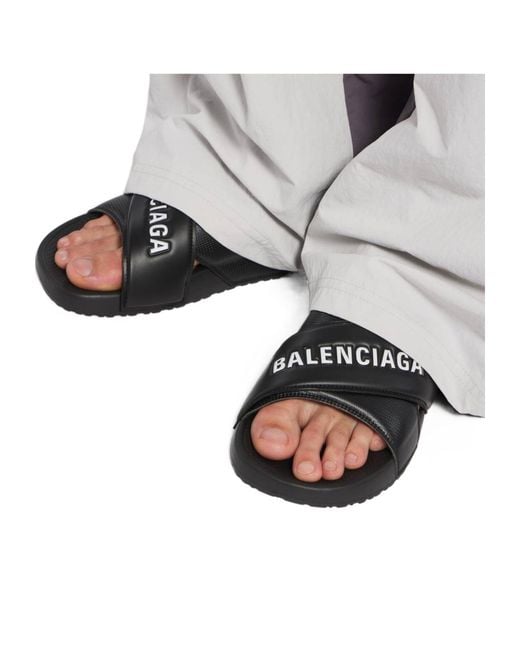 Balenciaga Black Crisscross Logo Slides for men