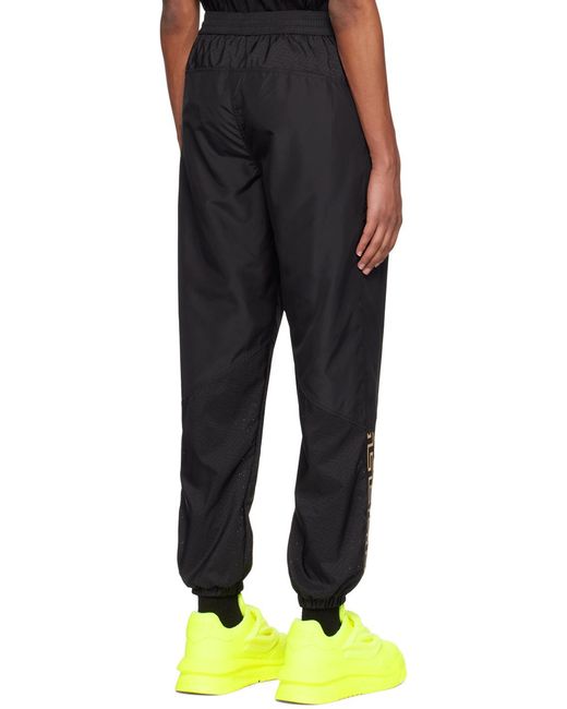 Versace Black Logo Printed Track Pants for men