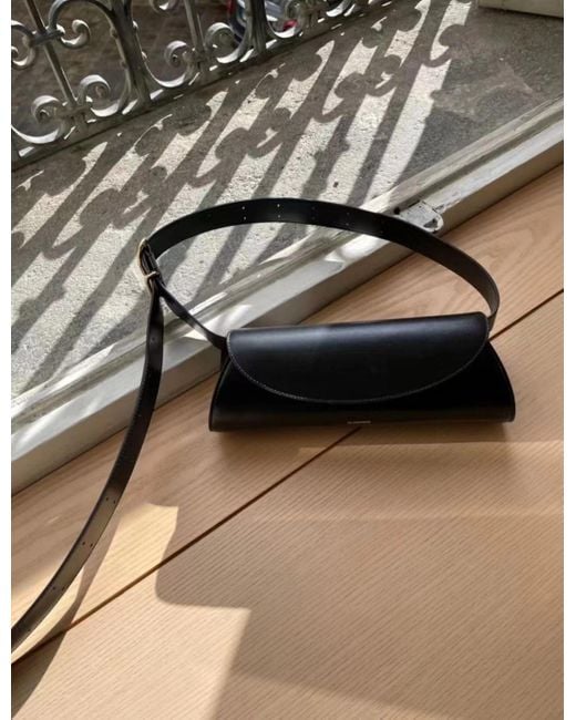 Jil Sander Black Cannolo Logo Embossed Small Shoulder Bag