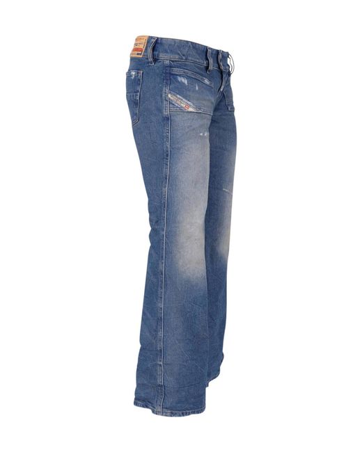 DIESEL Blue Flared Distressed Jeans