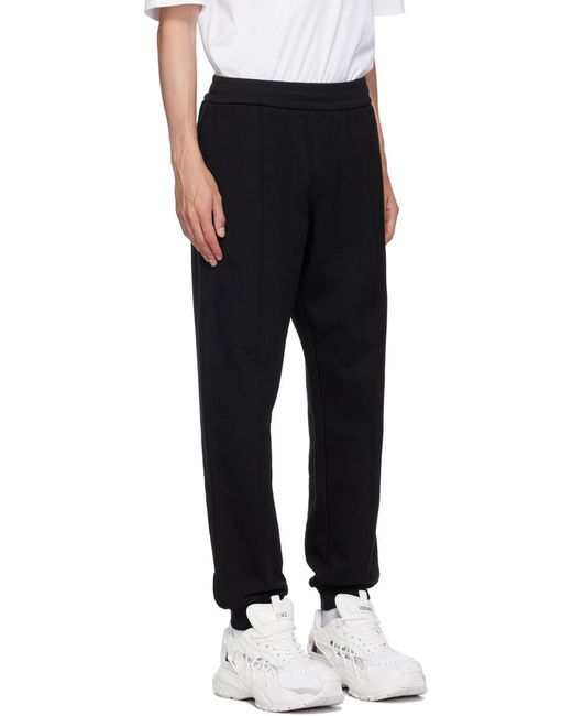 Versace Black Logo-Embroidered Elasticated Waistband Track Pants for men