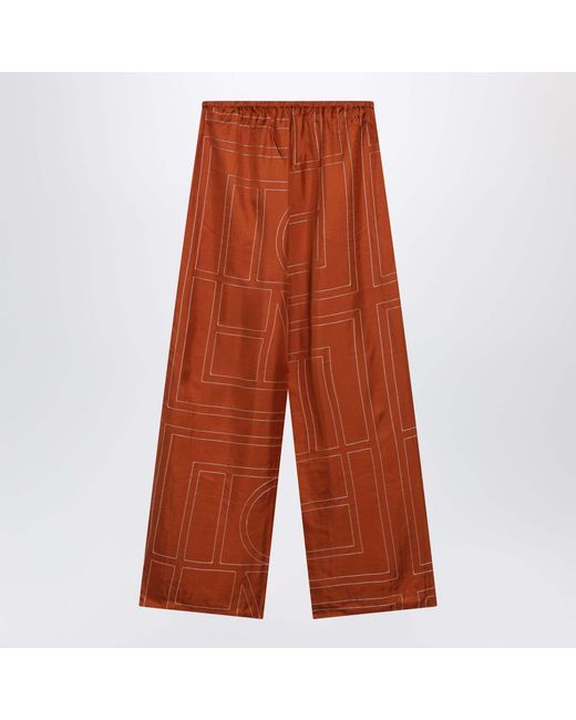 Totême Orange Monogram Silk Pajama Trousers