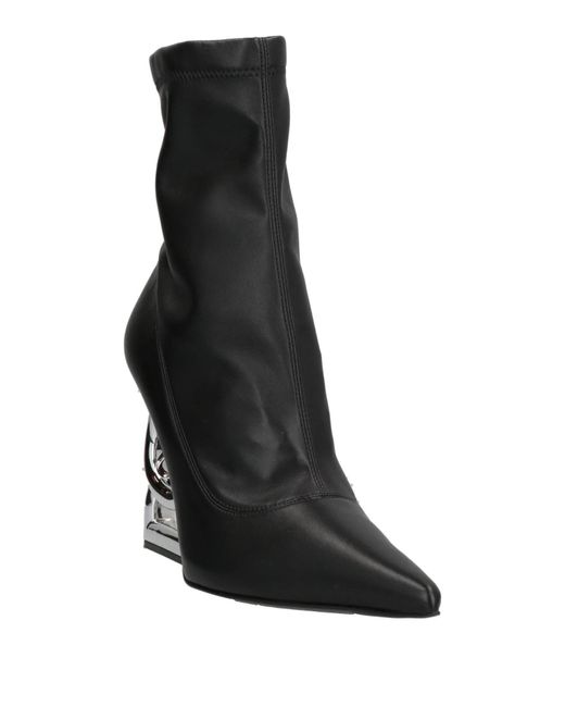Dolce & Gabbana Black Solid Color Ankle Boots