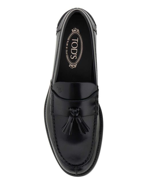 Tod's Black Round Toe Slip-On Loafers for men