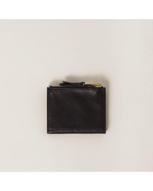 Miu Miu Black Logo Embossed Zipped Wallet