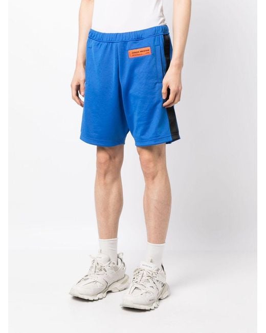 Heron Preston Blue Logo-Patch Track Shorts for men