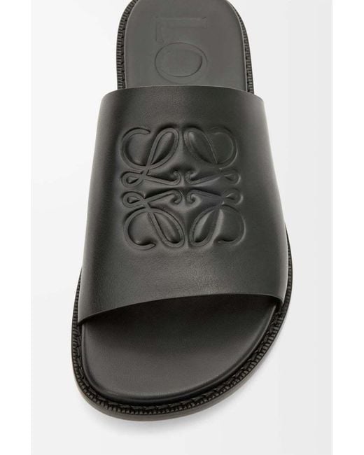 Loewe Black Flex Anagram Round Toe Slides for men