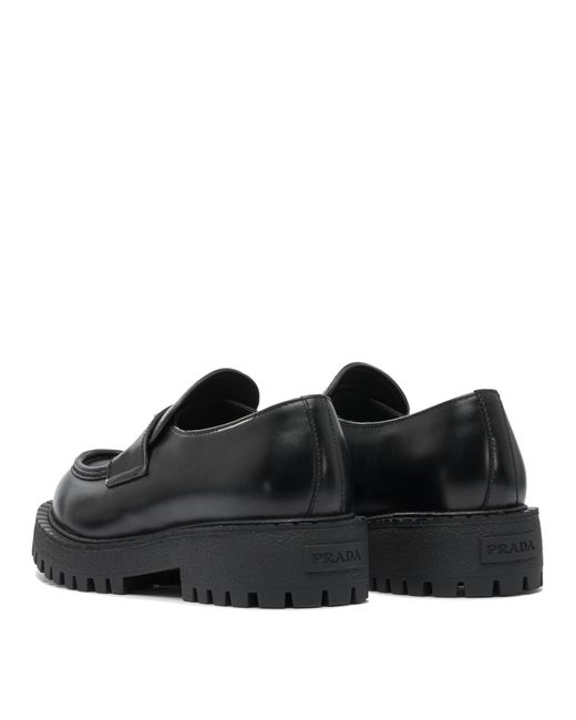 Prada Black Logo Plaque Slip-On Loafers for men