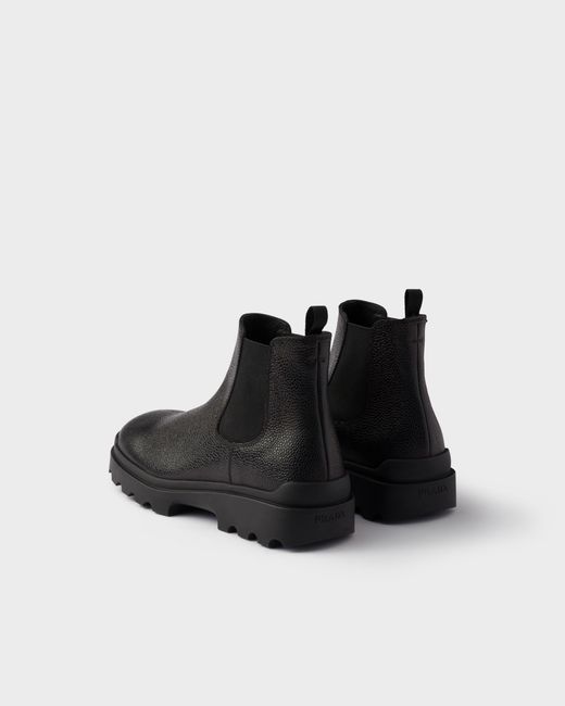 Prada Black Stamped Leather Chelsea Boots for men