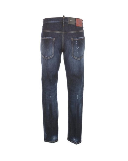 DSquared² Blue Ripped Mid-Rise Skinny Jeans for men