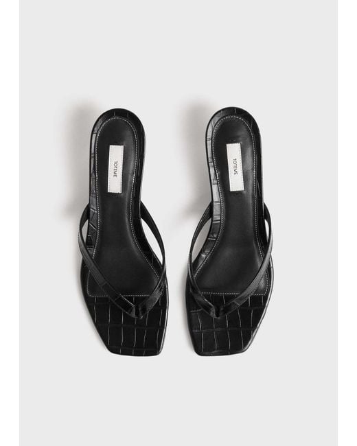 Totême White Totême Embossed Flip Flops