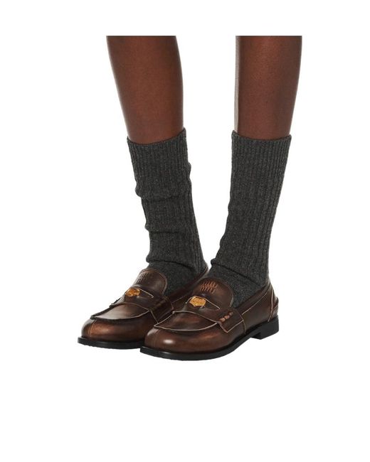 Miu Miu Brown Logo Embossed Slip-On Penny Loafers