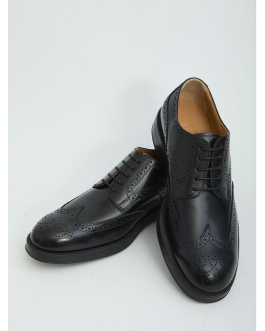 Tod's Black Wingtip Brogue Derby Shoes for men