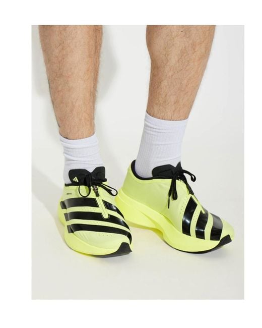 Adidas Yellow Round-Toe Sneakers for men