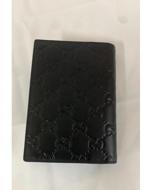 Gucci Black Gg Emblem Passport Holder