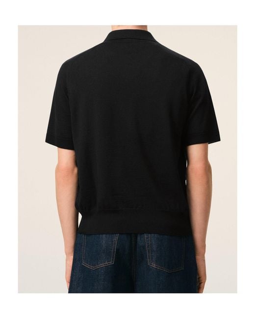 AMI Black Ami Logo Embroidered Ribbed Hem Polo Shirt for men