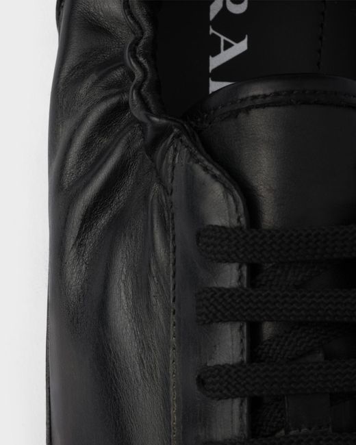 Prada Black Leather Collapse Sneakers for men