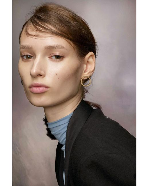 Maison Margiela Metallic Star Circular Studded Earrings for men