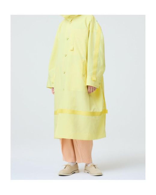 Homme Plissé Issey Miyake Yellow Carrier Carried Hooded Logo-Print Coat for men