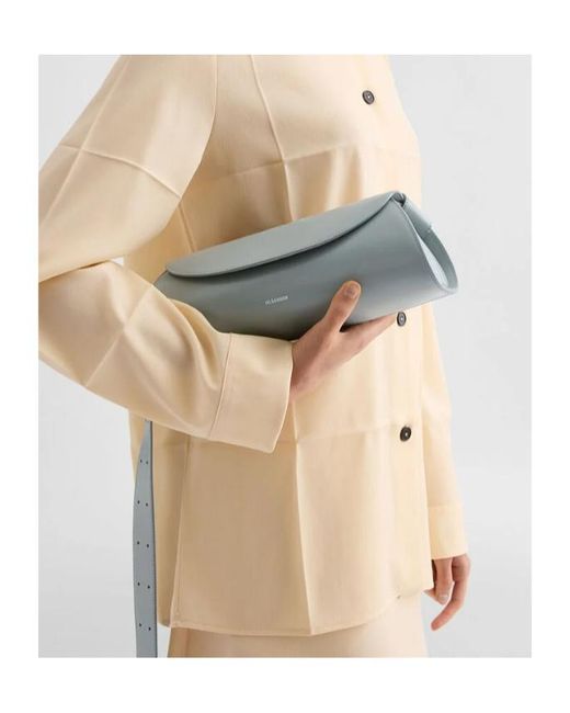 Jil Sander Metallic Cannolo Logo Embossed Small Shoulder Bag