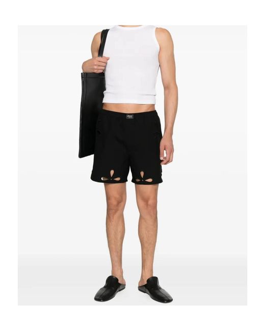 Coperni Black Petal Cut-Out Shorts for men