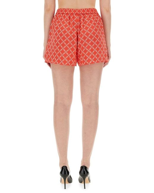 MICHAEL Michael Kors Red Empire Logo-Print Satin Shorts