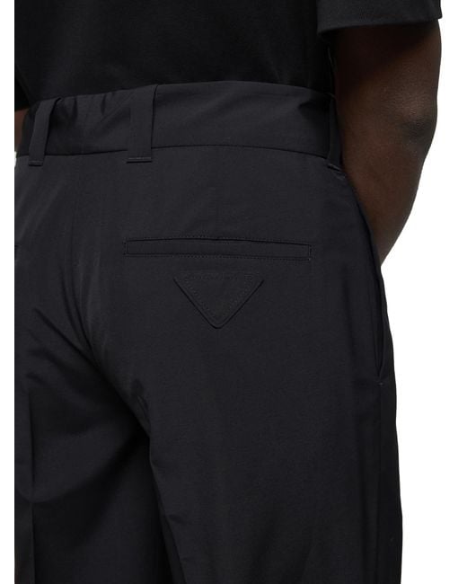 Prada Blue Logo Detailed Tapered Leg Trousers for men