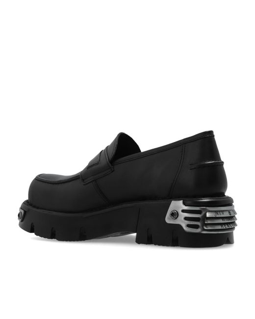 Vetements Black Logo-Embossed Leather Loafers for men