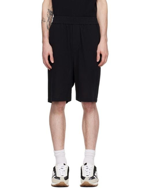 AMI Black Logo Plaque Bermuda Shorts for men