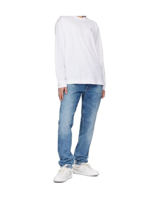 Givenchy Blue Logo Embroidered Distressed Jeans for men